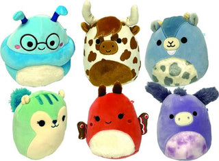 A purple cow with a tie-dye print belly, a brown cow with bangs, a blue alien with round frame glasses, a blue beaver with a cow print belly, a green squirrel with a blue tail, a red butterfly with small wings