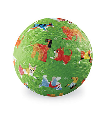 A green ball with different dog breeds printed on it