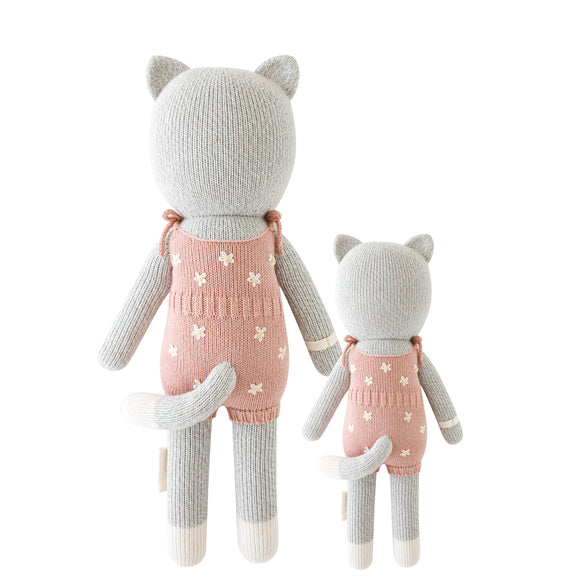 Back shot of the 2 different sized cat stuffies