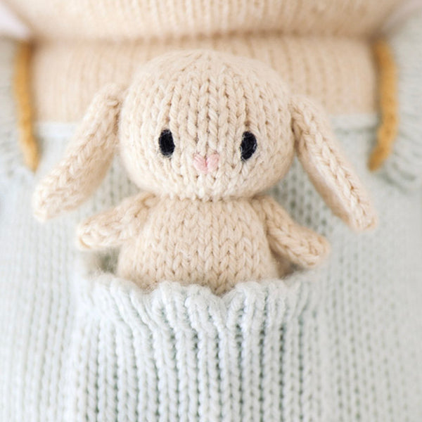 Close up picture of the mini bunny in the pocket