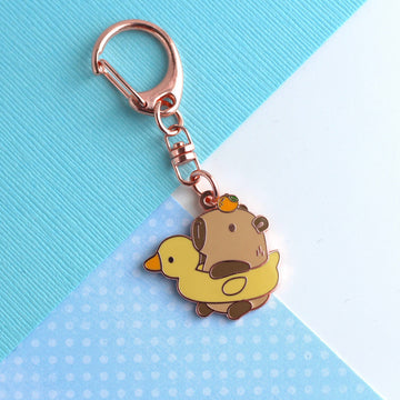 Capybara in Duck Floatie with Yuzu Enamel Keychain