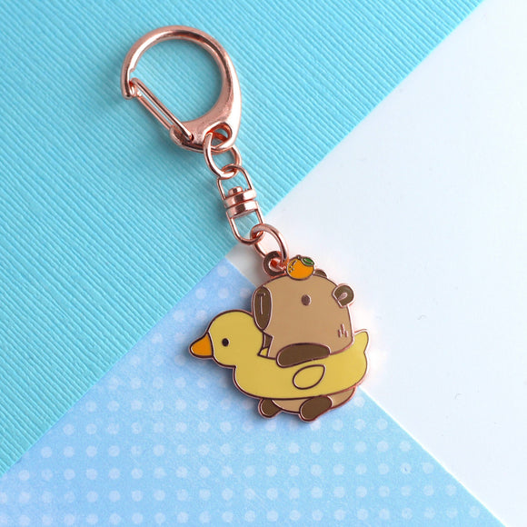 Capybara in Duck Floatie with Yuzu Enamel Keychain