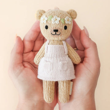 Tiny Olivia the Honey Bear - Handmade knitted honey bear wearing white dress with flower crown, unique Canadian baby gift.
