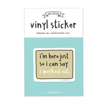 I Worked Out Vinyl Sticker - Rectangular beige vinyl sticker with black lowercase text "i’m here just so i can say i worked out" on white backing card.