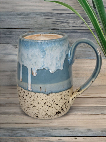 Winterwood Mug - Ceramic mug with speckled beige base and glossy blue drip glaze upper, curved handle, handmade stoneware.