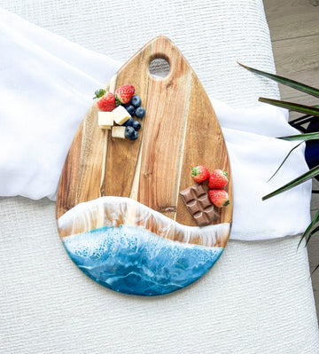 Rain Drop Shaped Charcuterie Boards - Handmade Canadian wood charcuterie board with ocean wave resin detail, unique gift shape.