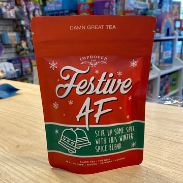 Festive AF Black Tea - Red festive tea pouch with white snowflakes, "Festive AF" bold text, handmade Canadian gift packaging.