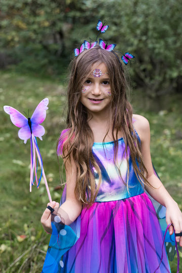 Float Like a Butterfly Wand - Purple and blue butterfly wand with ribbons held by child in matching pink and blue fairy costume.