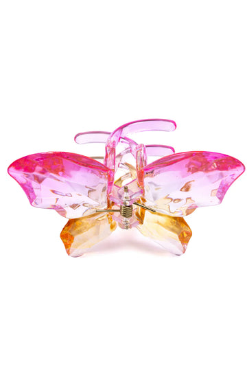 Flights of Fancy Butterfly Hairclip - Pink and amber translucent butterfly hairclip with textured wings and curved clasp.