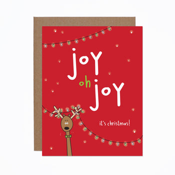 Oh Joy Christmas Card - Red Christmas card with playful reindeer and string lights, unique handmade Canadian holiday gift.