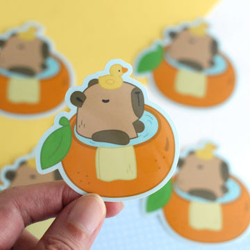 Capybara in an Orange Bath Vinyl Sticker - 0