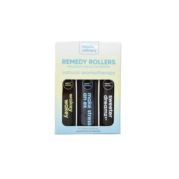 Remedy Roller 3 Pack 100% Natural ESSENTIAL OILS - Set of three Canadian handmade Remedy Roller essential oils in clear roller bottles with black caps, labeled with scent.