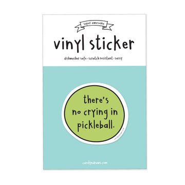 No Crying In Pickleball Vinyl Sticker - Round green vinyl sticker with black text "there's no crying in pickleball" on a light blue and white backing card.
