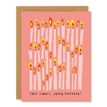 Lost Count Birthday Card - Unique handmade Canadian birthday card with pink candles forming "40" on coral background, includes kraft envelope.