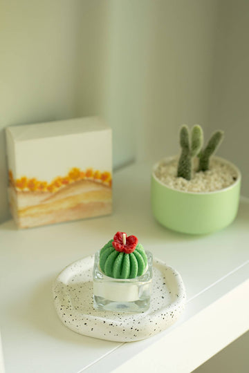 Barrel Cactus Tealight Candles - Handmade Canadian green barrel cactus tealight candle with red flower on speckled white ceramic dish, unique gift.