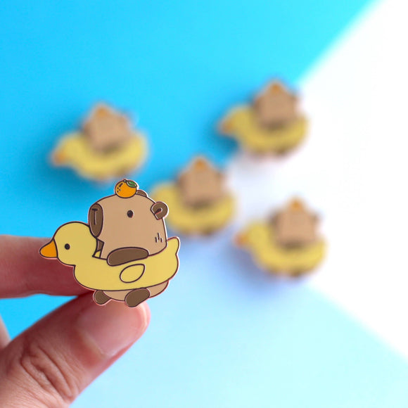 Capybara in a Duck Floatie with Yuzu Enamel Pin