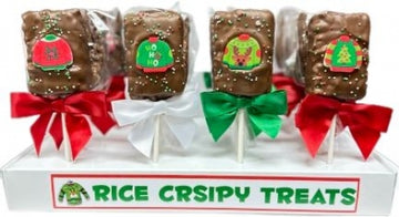 Christmas Chocolate Covered Rice Crispy Pops - Four handmade Canadian Christmas chocolate-covered rice crispy pops decorated with festive holiday stickers and red and.