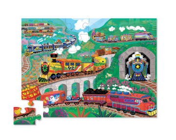 36 PC Puzzle: All Aboard - Colorful 36-piece jigsaw puzzle featuring cartoon trains, tracks, tunnels, and vibrant landscapes.