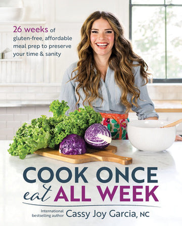 Cook Once, Eat All Week - Cook Once Eat All Week cookbook cover with smiling woman holding bowl, fresh kale and purple cabbage on countertop, unique.