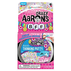 Thinking Putty - Crazy Aaron's BFF Thinking Putty tin with colorful rainbow design and friendship charms inside.