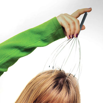 Head Massager - Handheld head massager with thin metal wires and black bead tips, held above scalp.
