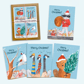 All 4 card designs next to the brown packaging.