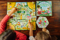  Kids playing the Gathering a Garden Board Game
