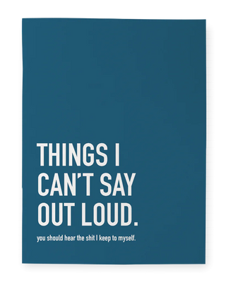 Blue Notebook with the phrase “Things I Can’t Say Out Loud. You Should Hear All the Shit Keep to Myself”
