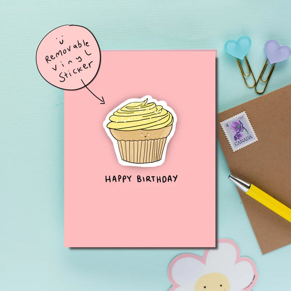 A pink card with a removable cupcake sticker and the words 