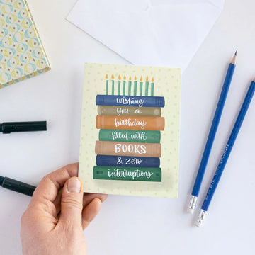 Book Birthday Card - Handmade birthday card with stacked books illustration and candle design, unique Canadian gift.