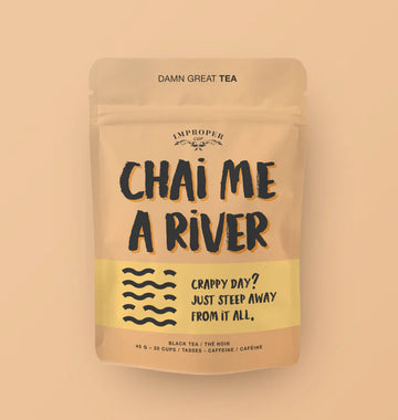 Chai Me A River Tea - Reusable beige pouch of Chai Me A River tea with black handwritten font, Canadian handmade gift packaging design.