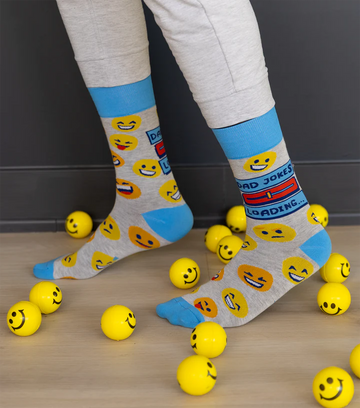 Men's Dad Jokes Socks - Handmade Canadian men's socks in blue and beige with playful emoji and "Dad Jokes" text, unique gift design.