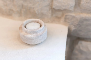 Lynn & Liana Tea Light Holder - Round handmade limestone tea light holder in soft gray with natural texture, Canadian artisanal gift.