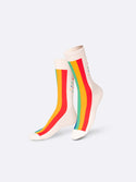 White socks with four stripes in red, yellow, turquoise and blue as well as sprinkles on the back of the shin
