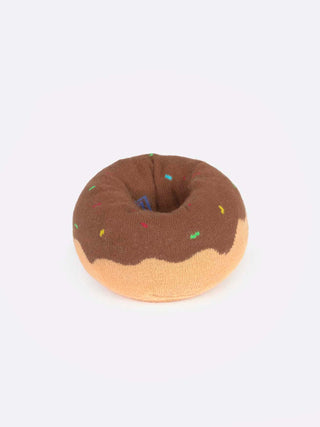A blue box with a clear panel displaying socks folded to resemble a brown donut with sprinkles