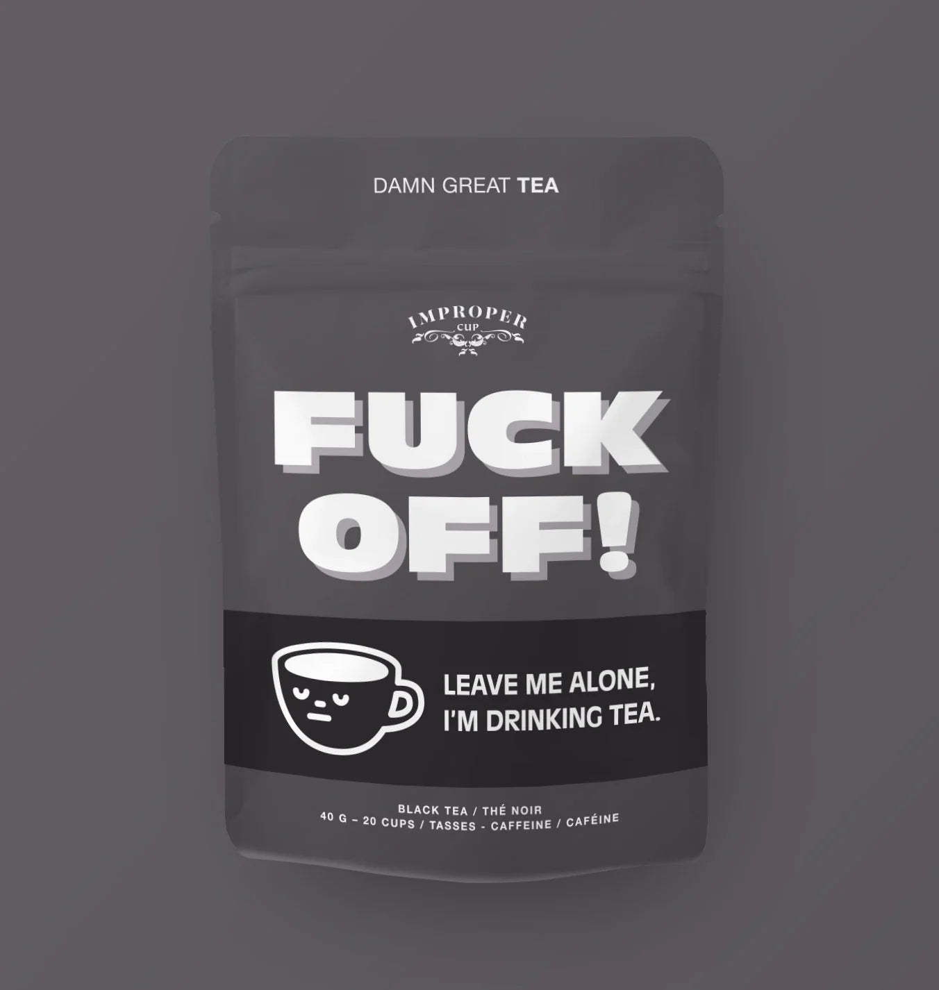 A black bag with large white font reading "FUCK OFF!" and an illustration of a mug with an unimpressed face next to "Leave me alone, I'm drinking tea"