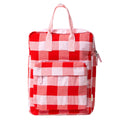 A checkered red rucksack