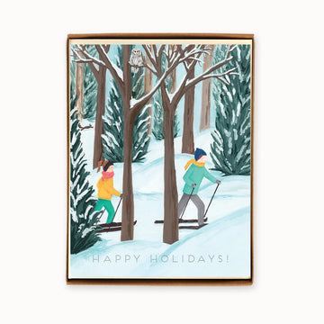 Box of 8 Holiday Cross Country Cards | The Paperhood - Box of 8 handmade Canadian holiday cards featuring unique winter cross-country skiing scene with snow-covered trees and.