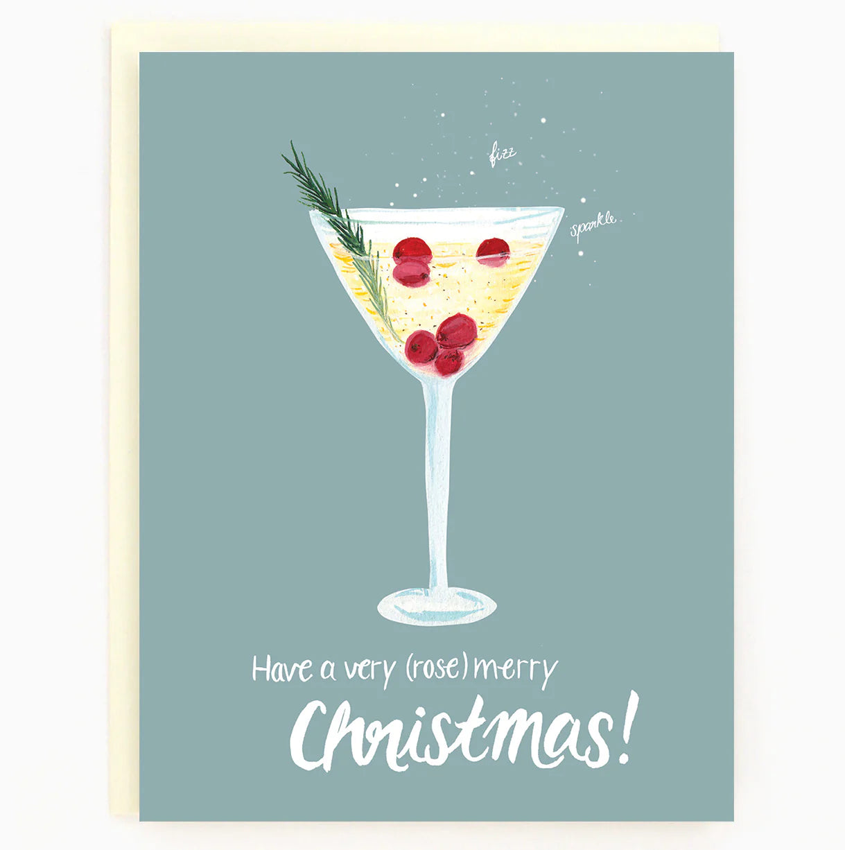 A light blue card with white text reading "Have a very (rose) merry Christmas" underneath a martini glass with rose, cranberries and thyme