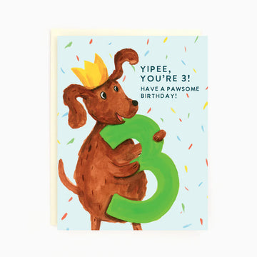 3rd Birthday Dog Card | The Paperhood - Handmade Canadian birthday card with brown dog wearing yellow crown holding green number 3 with confetti background, unique.
