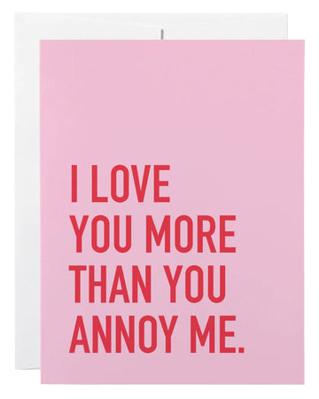 Annoy Me Card - Pink handmade greeting card with red text reading "I Love You More Than You Annoy Me" and a white envelope, unique Canadian.