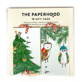 Two gift tag sets next to each other. The tag on the left depicts a Christmas tree with 5 cats in it. The tag on the right depicts two owl ornaments hanging from a Christmas tree.