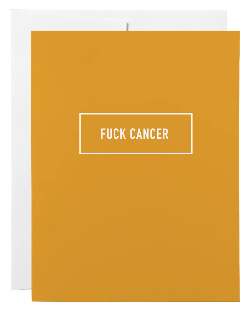 A yellow card with the words "Fuck Cancer"