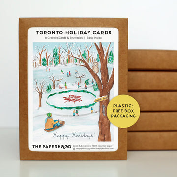 Toronto High Park Holiday Cards Box of 8 - Box of 8 Canadian handmade holiday cards featuring winter ice skating scene in plastic-free packaging, unique gift.
