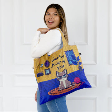 Judging You Tote Bag - Yellow and blue handmade Canadian tote bag with cartoon cat and "silently judging you" text, unique gift.