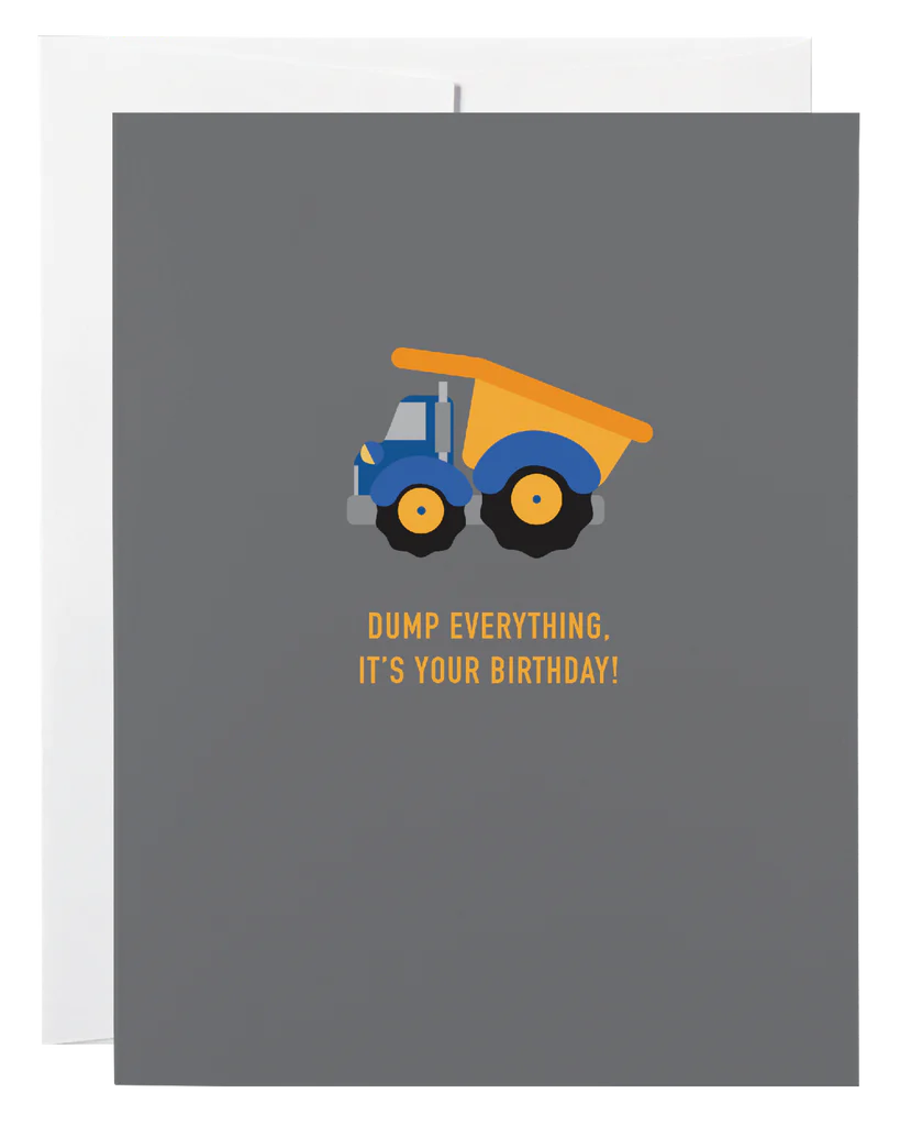 A dark blue card with a picture of a dump truck and the words "Dump Everything It's Your Birthday!"