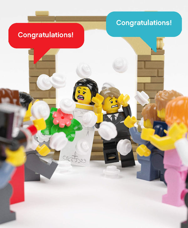 A notecard with 2 married LEGO people with scared faces as other LEGO people are throwing LEGO confetti at the newlyweds