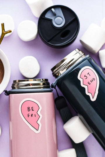Bestie Vinyl Stickers - Pink and black travel mugs with handmade Canadian Bestie vinyl stickers and marshmallows scattered around.