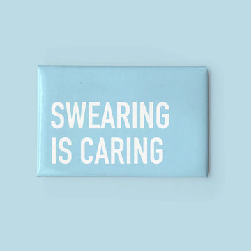 Swearing is Caring Magnet - Blue rectangular handmade magnet with bold white text saying "SWEARING IS CARING," unique Canadian gift accessory.