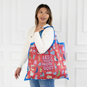 More Dogs Tote Bag - Red tote bag with blue trim featuring cartoon dogs and "Less People More Dogs" text, unique handmade Canadian gift.